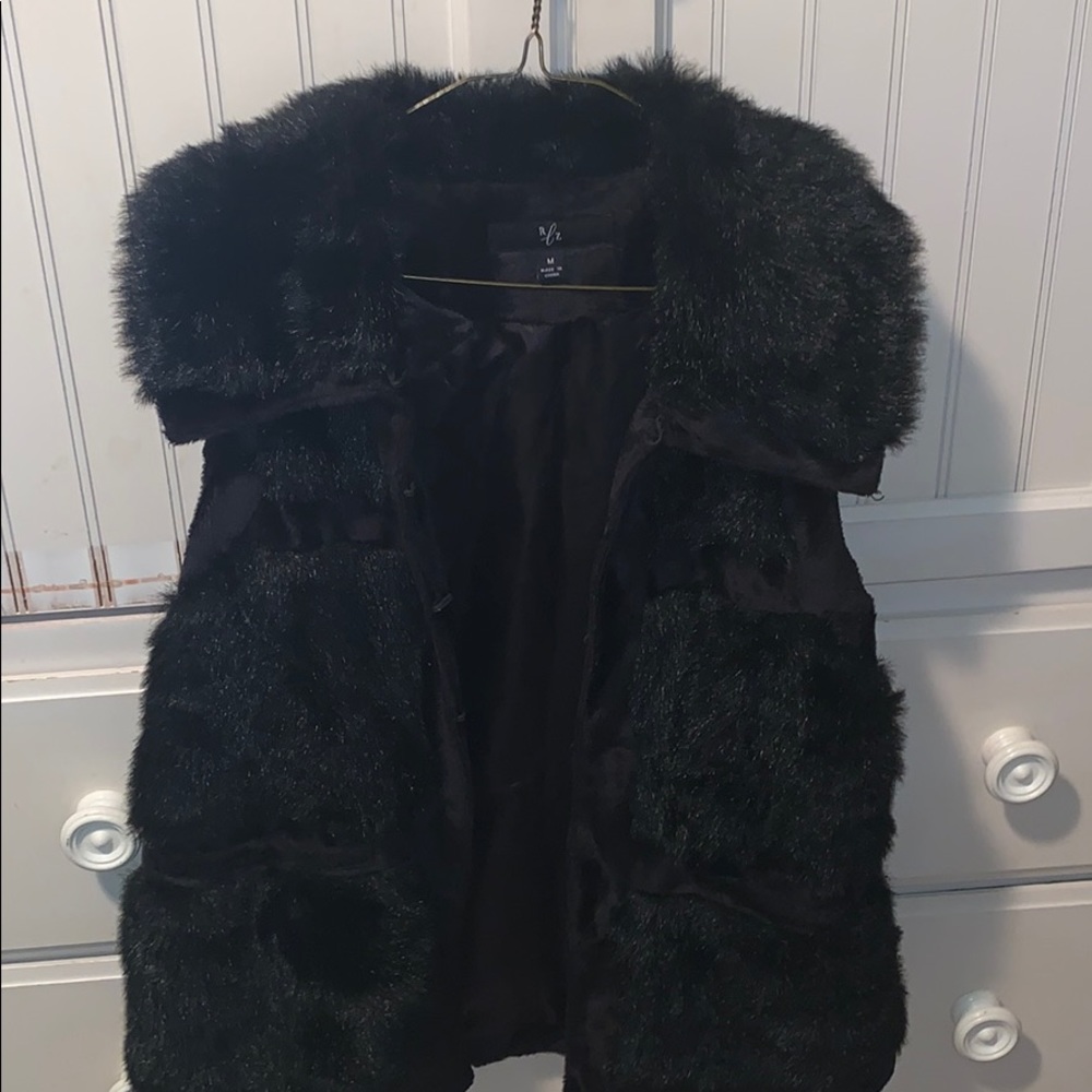 Black faux fur vest